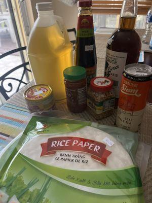 Fish sauce, oyster sauce, chili garlic paste, madman & parang curry paste, fried crushed garlic, & trying a can of Thai style tea.