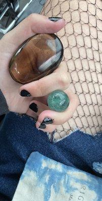 ignore the nails but smokey quartz and rainbow fluorite