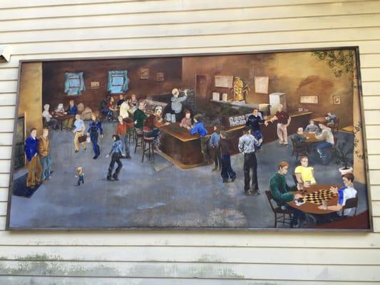 Mural by the eclectic outdoor eating area.