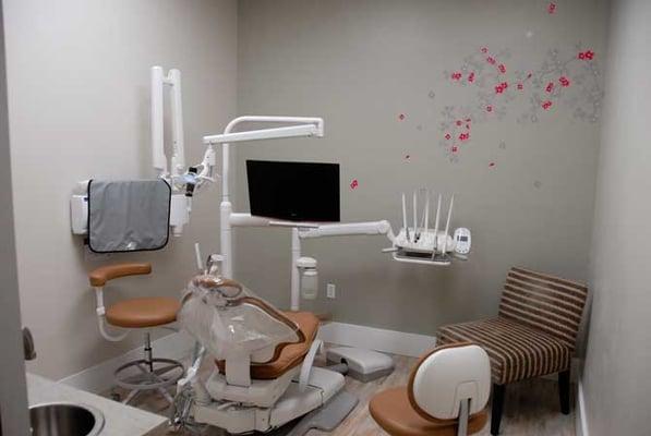 A treatment room at the Dental Spot (Yes, that's a TV you can watch :) )