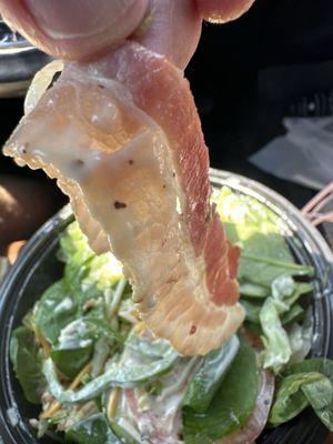 Raw bacon in my salad