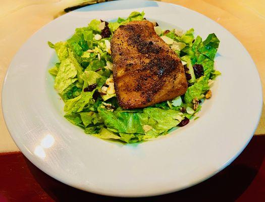 signature orange bowl salad with added bronzed salmon