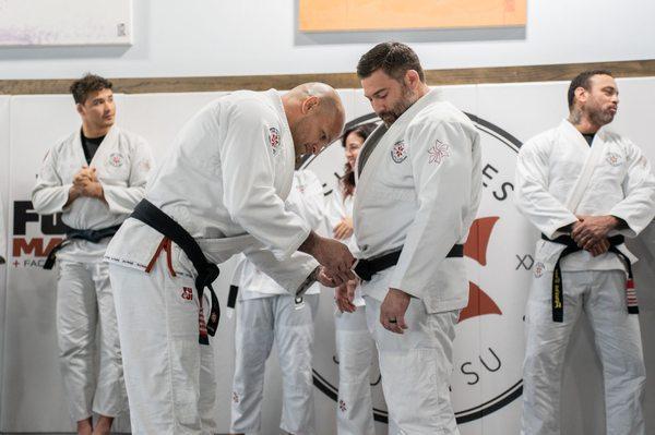 Professor Emil @takeuchifightclub promoted to 2nd degree black belt by Sensei Xande Ribeiro