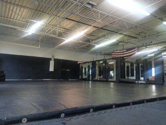 Brazilian Jiu Jitsu , Kickboxing, boot camp matted side.