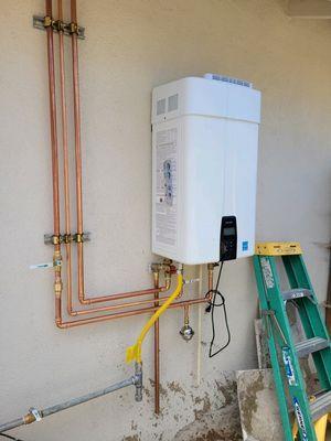 Replaced a tank-style water heater with a Navien Tankless unit.