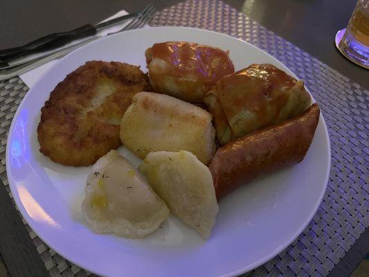 Gollumpke, kielbasa, perogi, potato pancake and Polish egg roll