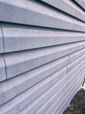 This is what my siding looked like after they power washed it.