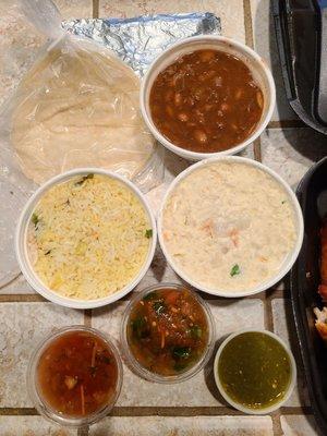 Medium rice, medium beans, and medium potato salad. 1 packet of tortillas and salsa.