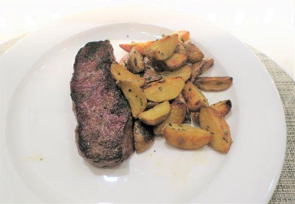 Strip streak, roasted rosemary potatoes - excellent