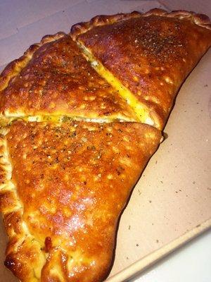 Our infamous and underrated calzone! Cheesy goodness!