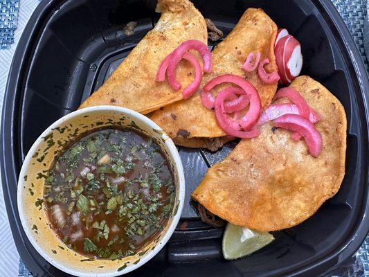 Birria tacos--wasn't bad. Worth trying next time dining in.