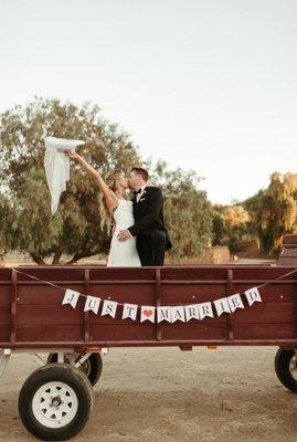 The wagon they transported the wedding party on via tractor! So fun!!!