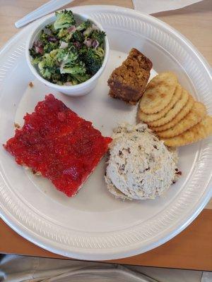 Cranberry pecan chicken salad, broccoli salad, and strawberry pretzel salad.