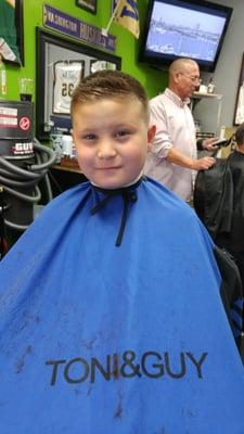 My nephew is very happy with his haircut