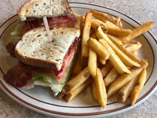 Our last meal before heading to the airport. BLT with fries. Didn't read menu right. Fries $2-somthing extra