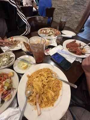 Crawfish Monica, pasta, supreme pizza.