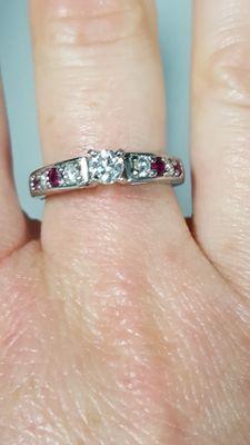 Diamonds and rubies from two existing rings placed a new setting.  Just stunning results!