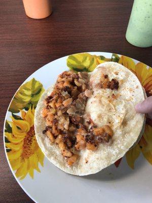 Papas con chorizo and beans