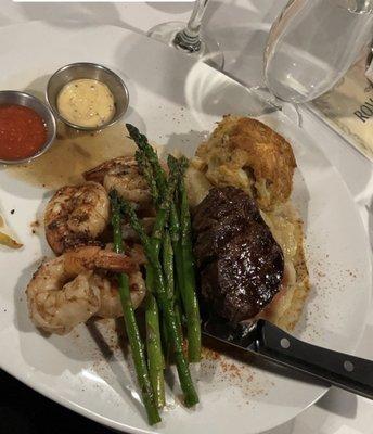 Surf and turf. Steak, shrimp, crab cake, mashed potatoes, and asparagus.