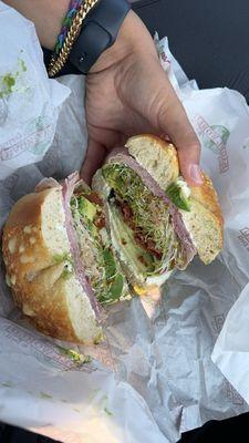 Asiago bagel, sprouts, mozzarella, bacon, Avocado, ham, chive cream cheese