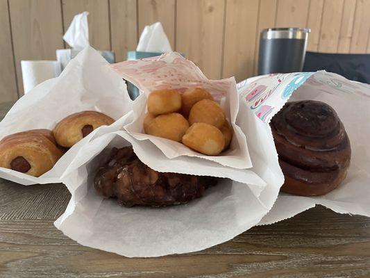 Kolaches, donut holes, apple fritter, cinnamon rolls