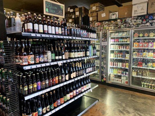 Local Oregon beer selection on this shelf with ciders in the background