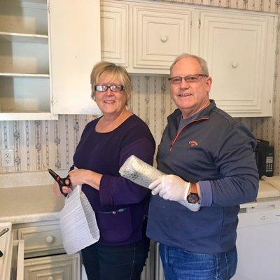 Block & Associates' Steve Collins & his wife Trish, furnishing an apartment for a family in need in the triangle.