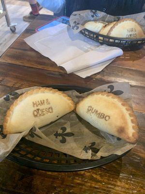 Ham with queso and gumbo empanadas.