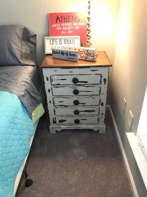 This is the nightstand after my teenage daughter painted and distressed it.