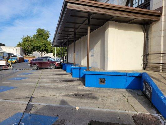 Handicapped Parking on side of building,  enter thru public parking lot