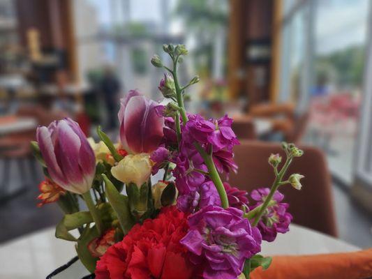 Floral arrangements on each table