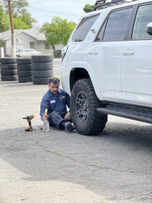 Tire man doing work