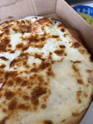 Hair on the cheese pizza.