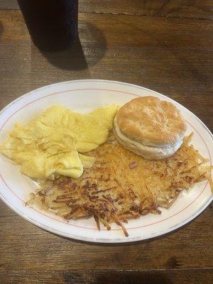 Scrambled eggs, hash browns and biscuit