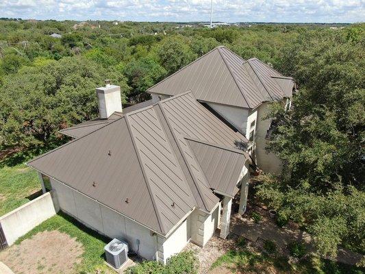 Standing seam metal roofing. Medium bronze color