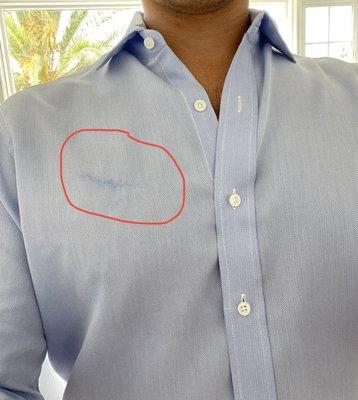 Heavy abrasion across rehearsal dinner shirt.