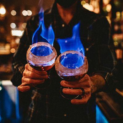 Niche Coffee - orange liqueur sets the rim ablaze, caramelizing cinnamon and sugar, then topped with Buffalo Trace bourbon cream, coffee, an