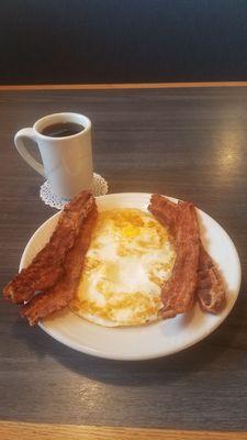 Crispy bacon, eggs over hard and a cup of black coffee--paleo made simple!