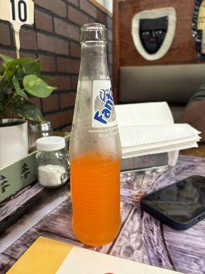 Orange Fanta. They have a cooler of sodas and other drinks