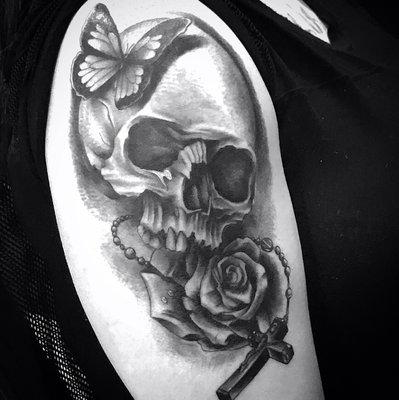 Classic skull and rose done March 2019