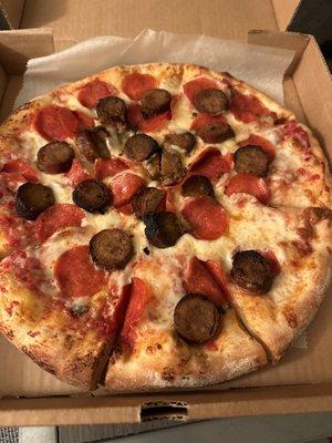 Pepperoni and Italian sausage pizza