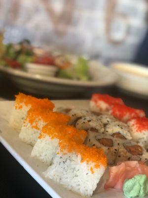 House salad, golden California roll, spicy tuna roll, beauty on the beach roll