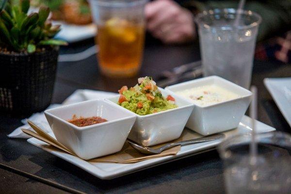 Housemade salsa, guacamole, and queso