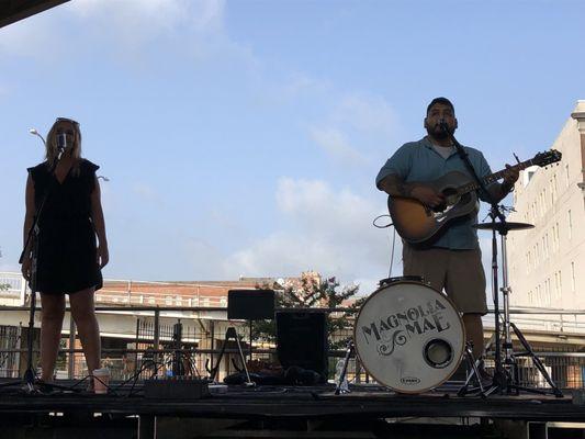 6/30/18. Saturday. Magnolia Mae. Strumming and singing delightfully on the market stage this fine, and glorious morning. 2018 Summer Market!