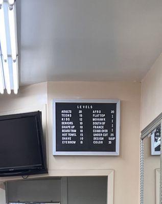 The price list that the barber "claims to be outdated!"