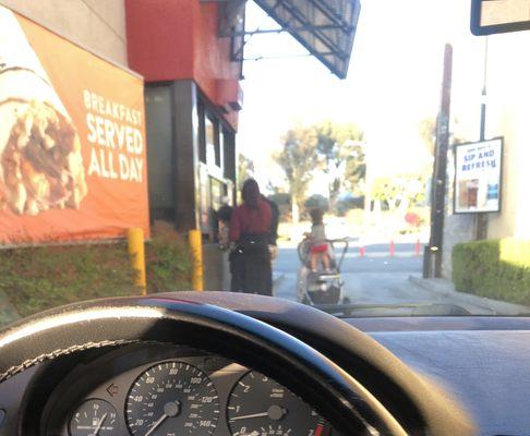 Jack In The Box (Montebello) - Irresponsible teens with unattended baby standing in stroller in drive thru.