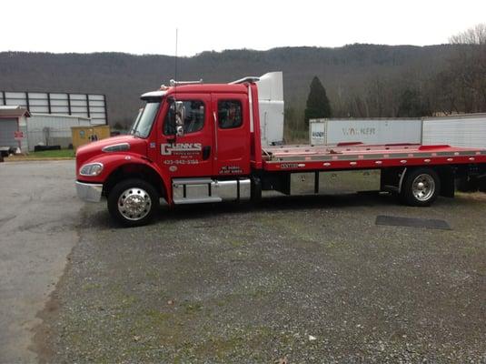 2013 Freightliner with 22 ft Century LCG rollback.