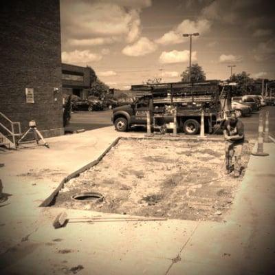 Parking lot and catch basin repair at UH...