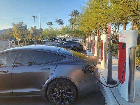 16 Tesla V3 superchargers. Currently fee .27 kw prime hours.