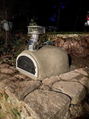 Pizza oven phase 1 Reinforced refractory cement dome with 2" ceramic firewool insulation and class a interior piping